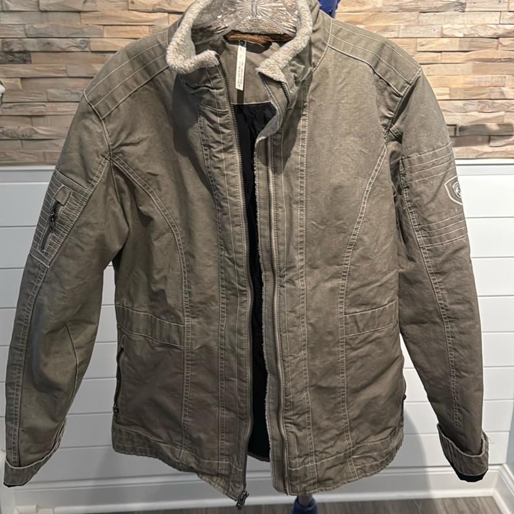 Kuhl jacket, rugged for cold weather. Tan with hint of olive color.